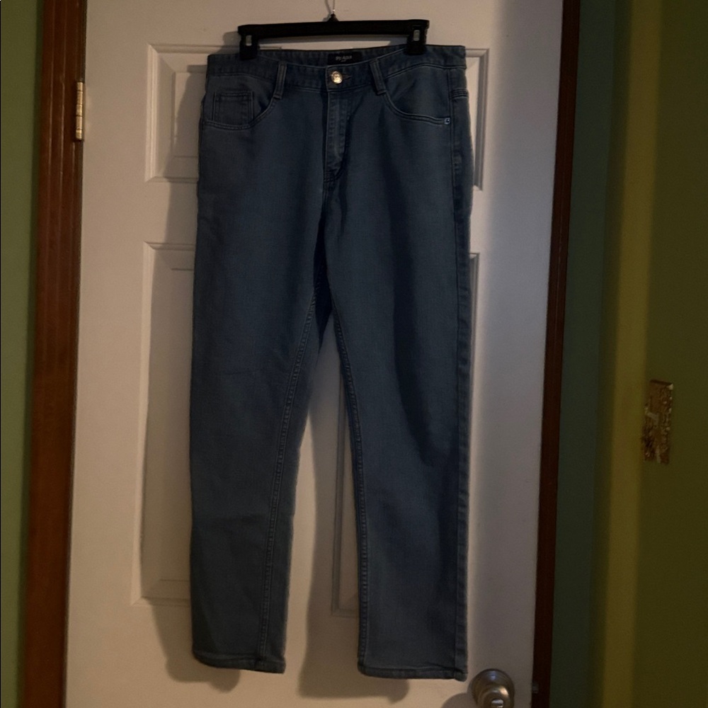 Size 8 preowned in great condition PRADA JEANS leather and metal patch RARE